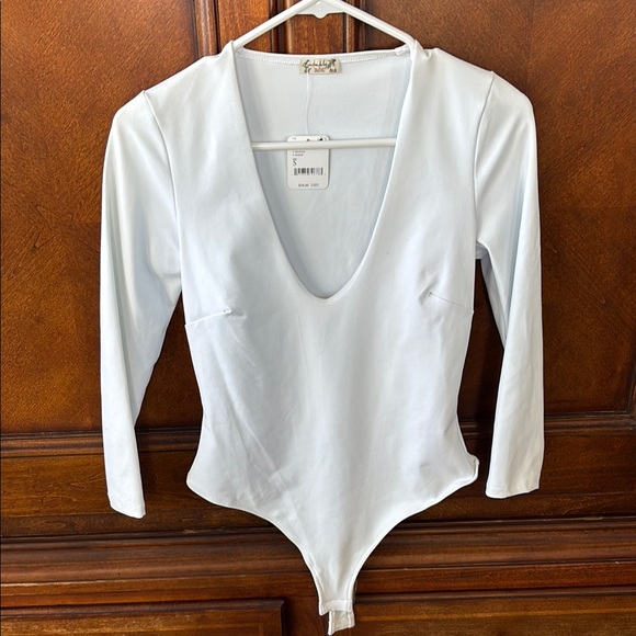 Free People Tops - Free People- 4 for $20 Bodysuits (4) sold together or sold individually $5 each
